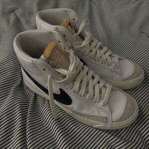 White High-Top Sneakers with Black Swoosh - women’s